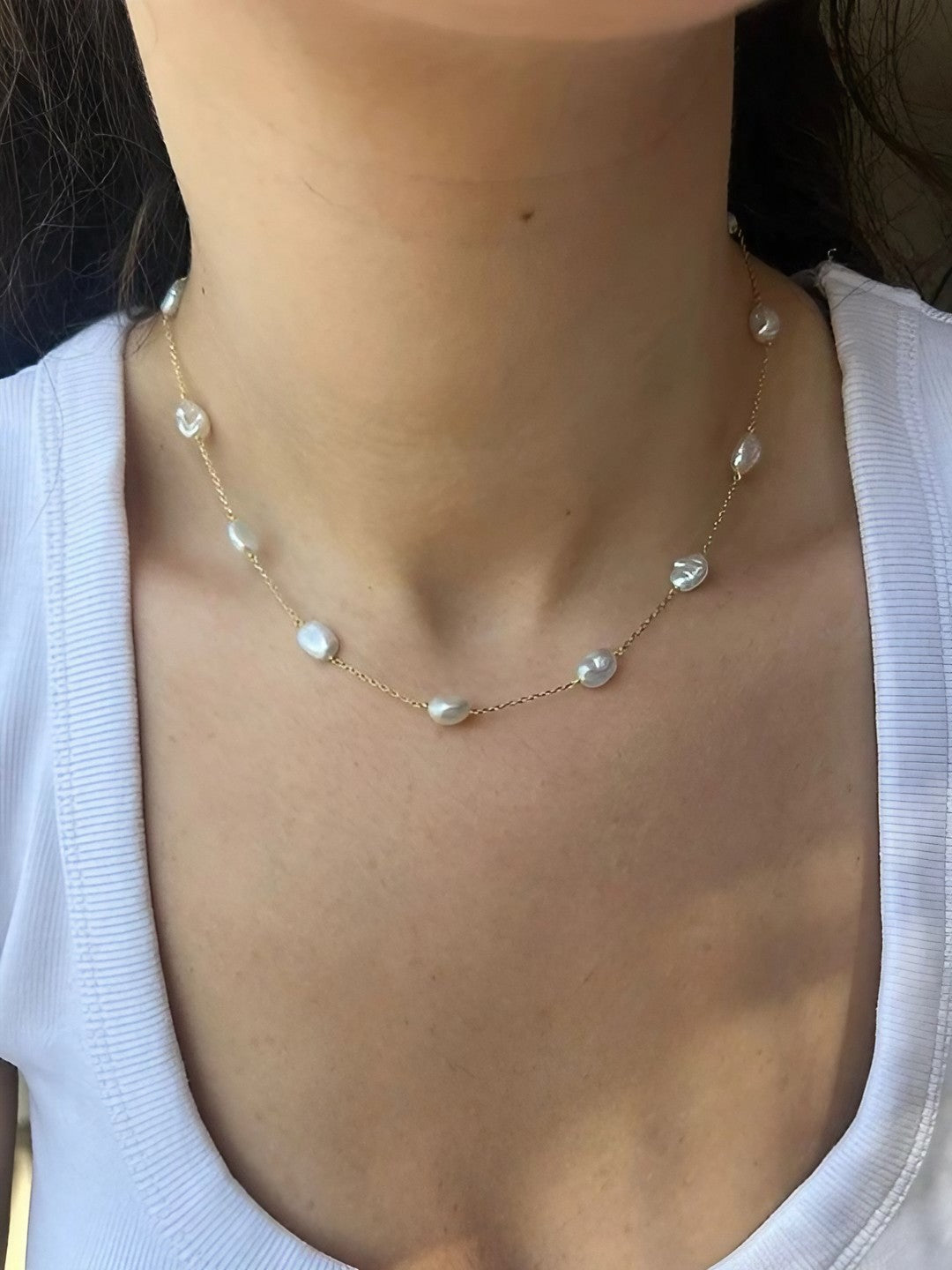 Exquisite Baroque Pearl Necklace, handcrafted in 18k solid gold, this station necklace, features a delicate gold chain adorned with lustrous Baroque Pearls that are uniquely shaped, offering a distinctive look that is both organic and sophisticated. | Ella Creations Jewelry