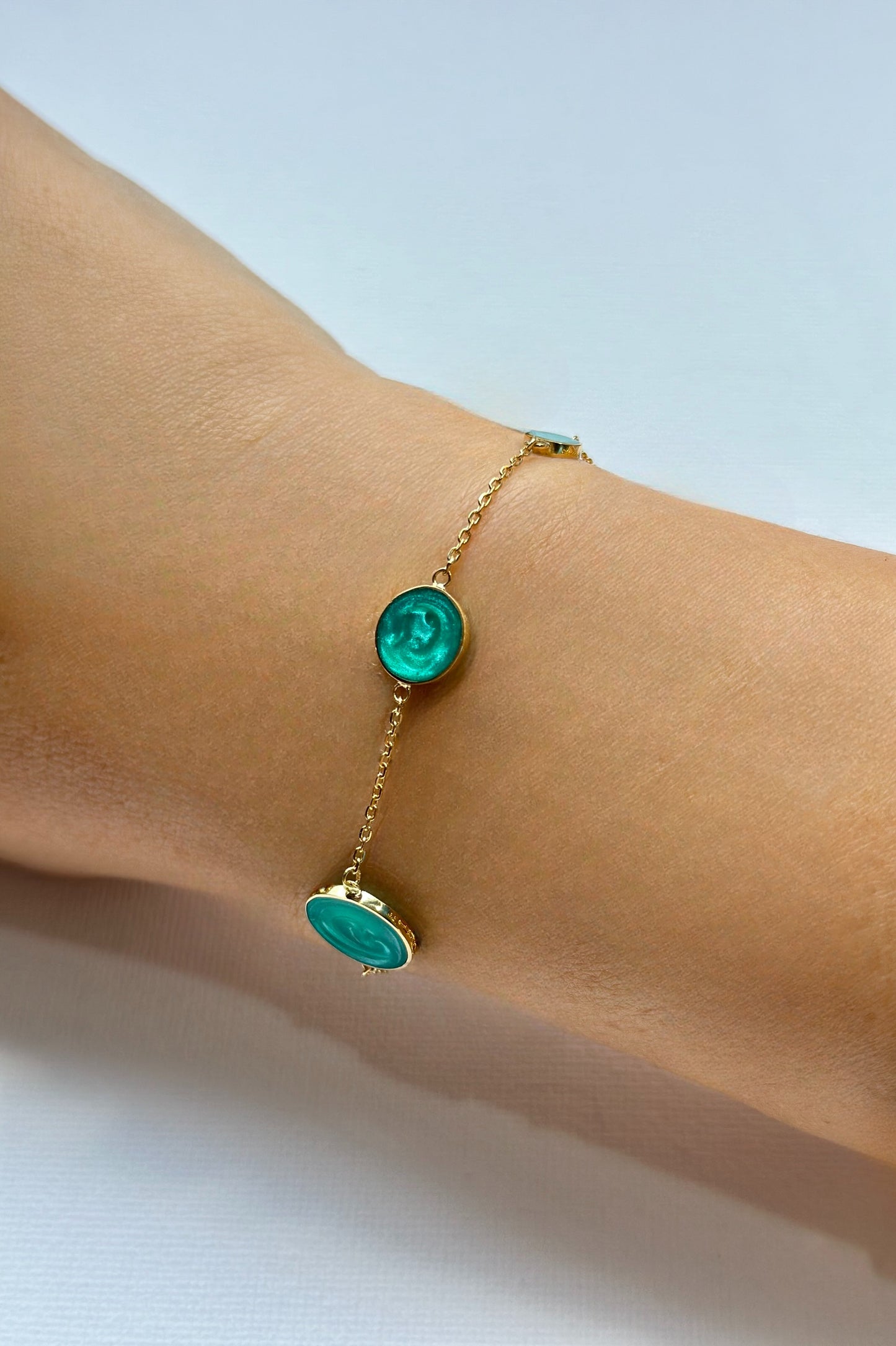 Solid Gold Bracelet perfect for everyday wear and to stack with other bracelets. This circles bracelet is handcrafted in 18 karat gold and features green malachite enamel finish | Ella Creations jewelry