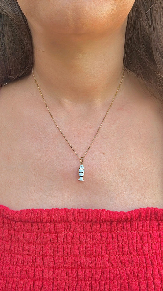 18k Gold Fish Charm, crafted in 18k yellow gold and beautifully accented with vibrant light blue and black enamel | Ella Creations Jewelry