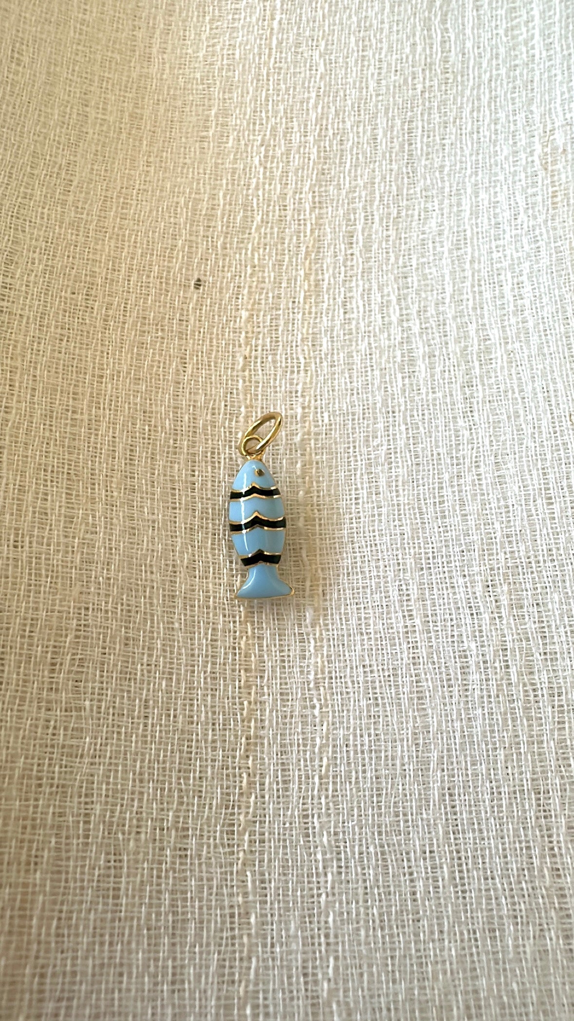 18k Gold Fish Charm, crafted in 18k yellow gold and beautifully accented with vibrant light blue and black enamel | Ella Creations Jewelry
