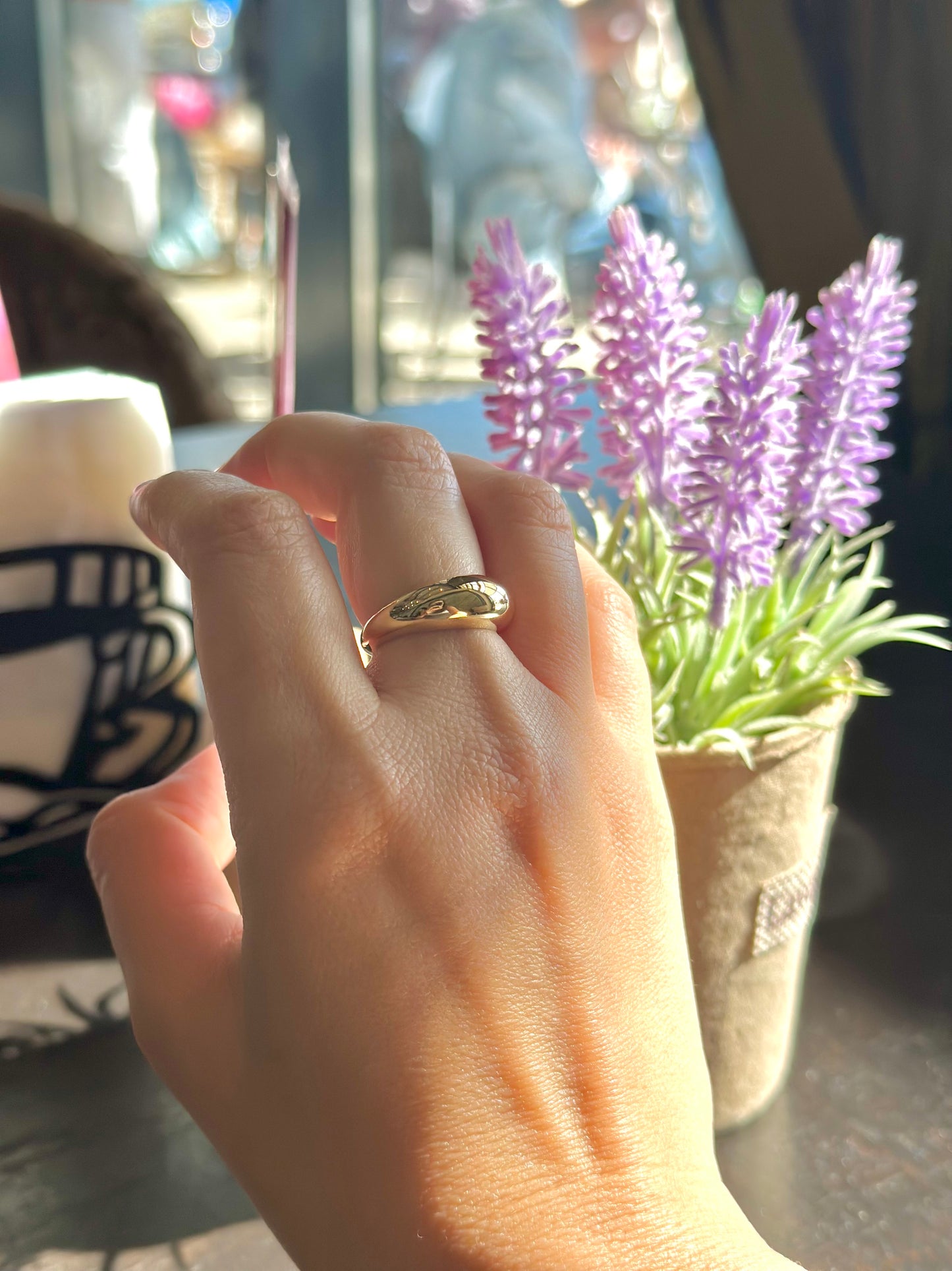 Gold Dome Ring handcrafted in 14k or 18k solid gold, the ring tampers from 7.5mm to 3mm | Ella Creations Jewelry
