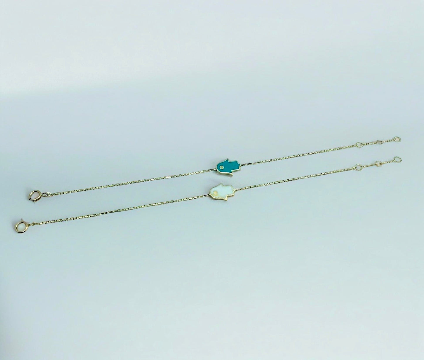 Hamsa gold bracelet handcrafted in 18k gold with your choice of enamel with or without side beads. Enameled on both sides.