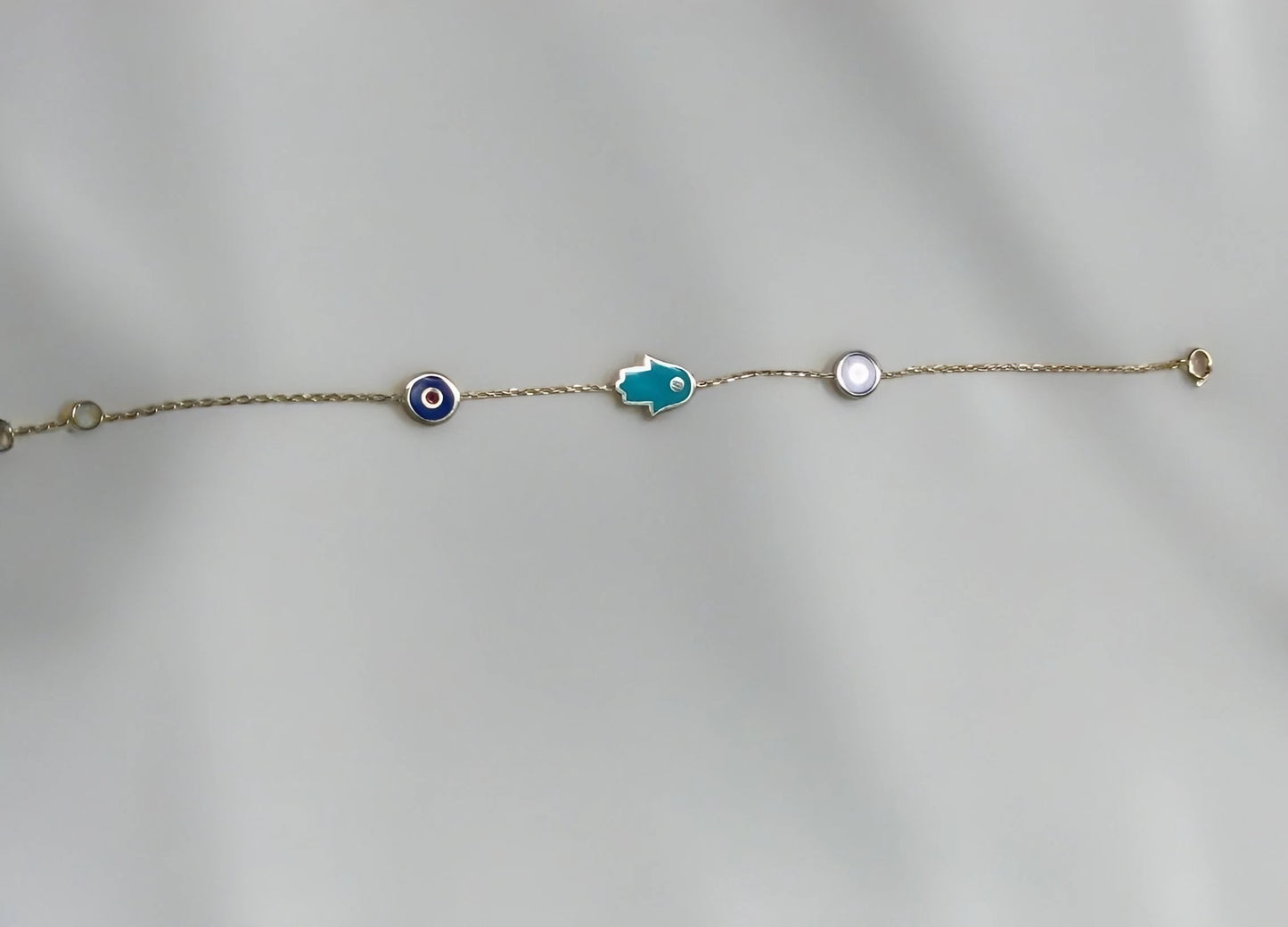 Evil eye and hamsa enameled 18k gold bracelet | Ella Creations Jewelry