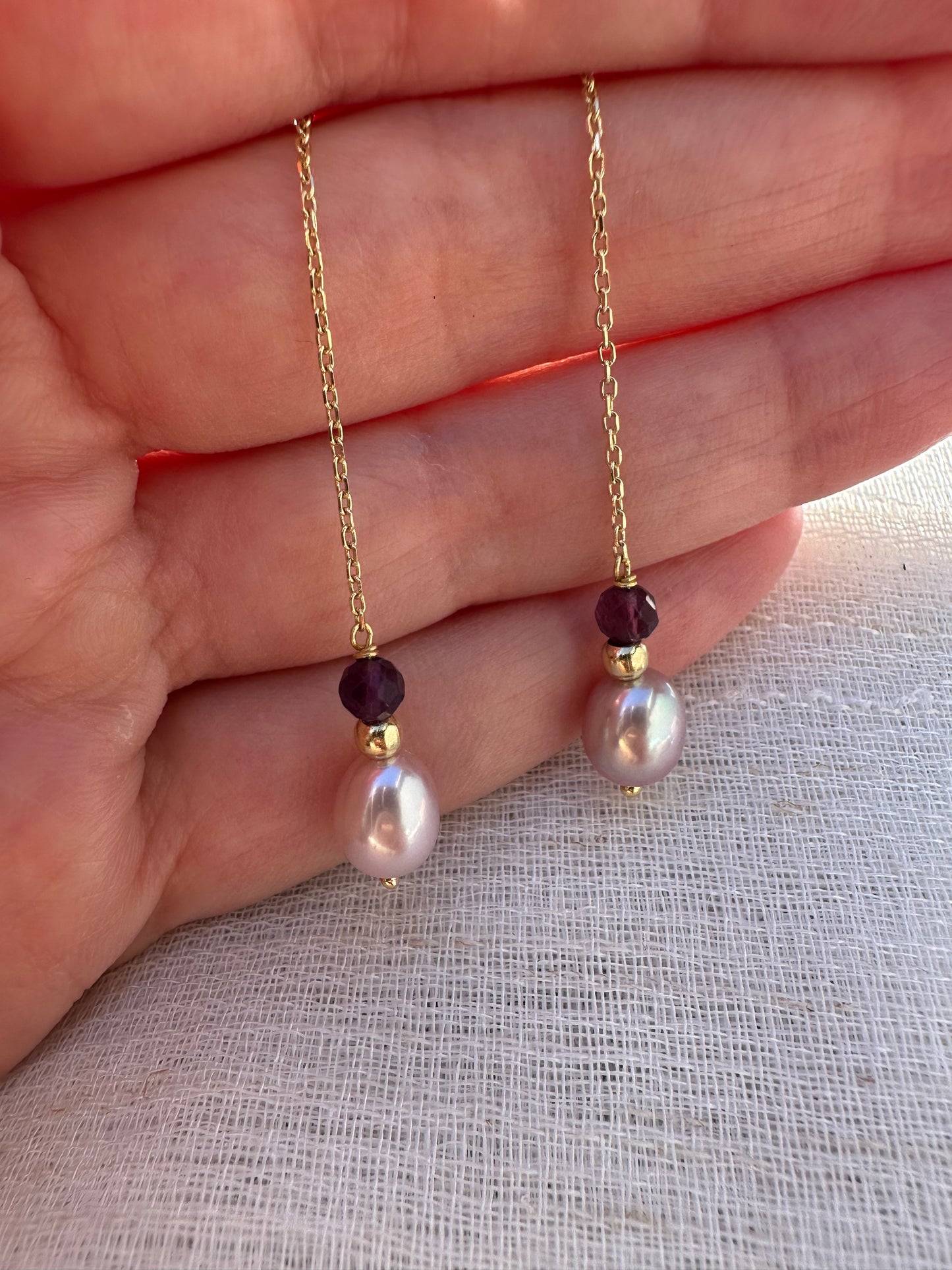 Threader Earrings handcrafted in 18 karat gold, featuring Pink pearls, a gold bead and a garnet bead, with a total length of 4.7" these earrings are perfect for a night or an elegant casual look | Ella Creations Jewelry