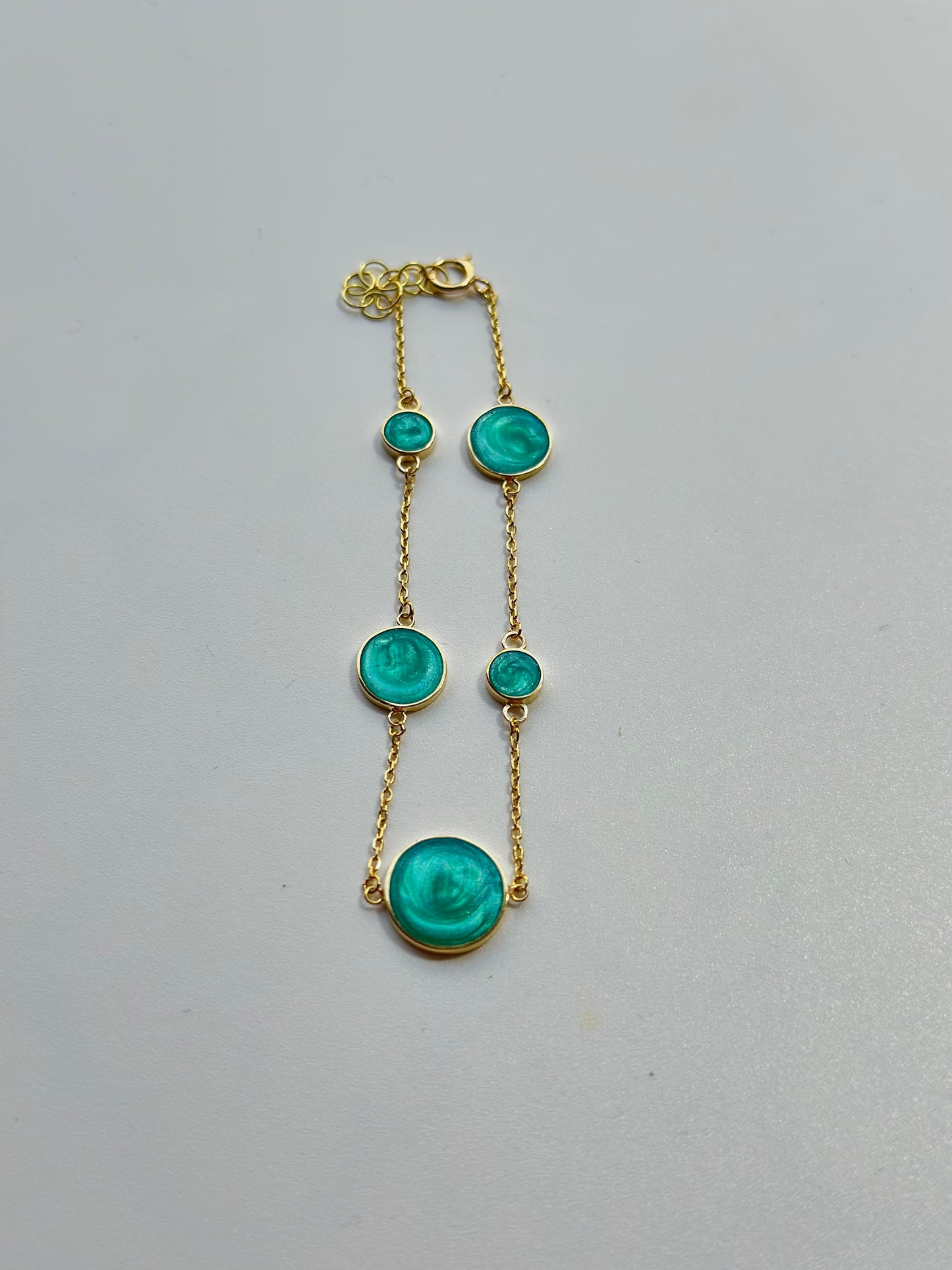 Solid Gold Bracelet perfect for everyday wear and to stack with other bracelets. This circles bracelet is handcrafted in 18 karat gold and features green malachite enamel finish | Ella Creations jewelry