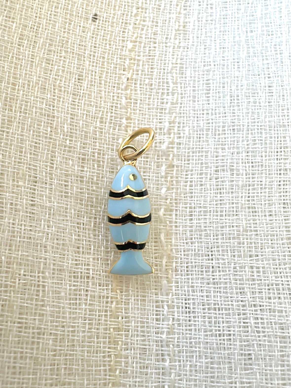 18k Gold Fish Charm, crafted in 18k yellow gold and beautifully accented with vibrant light blue and black enamel | Ella Creations Jewelry
