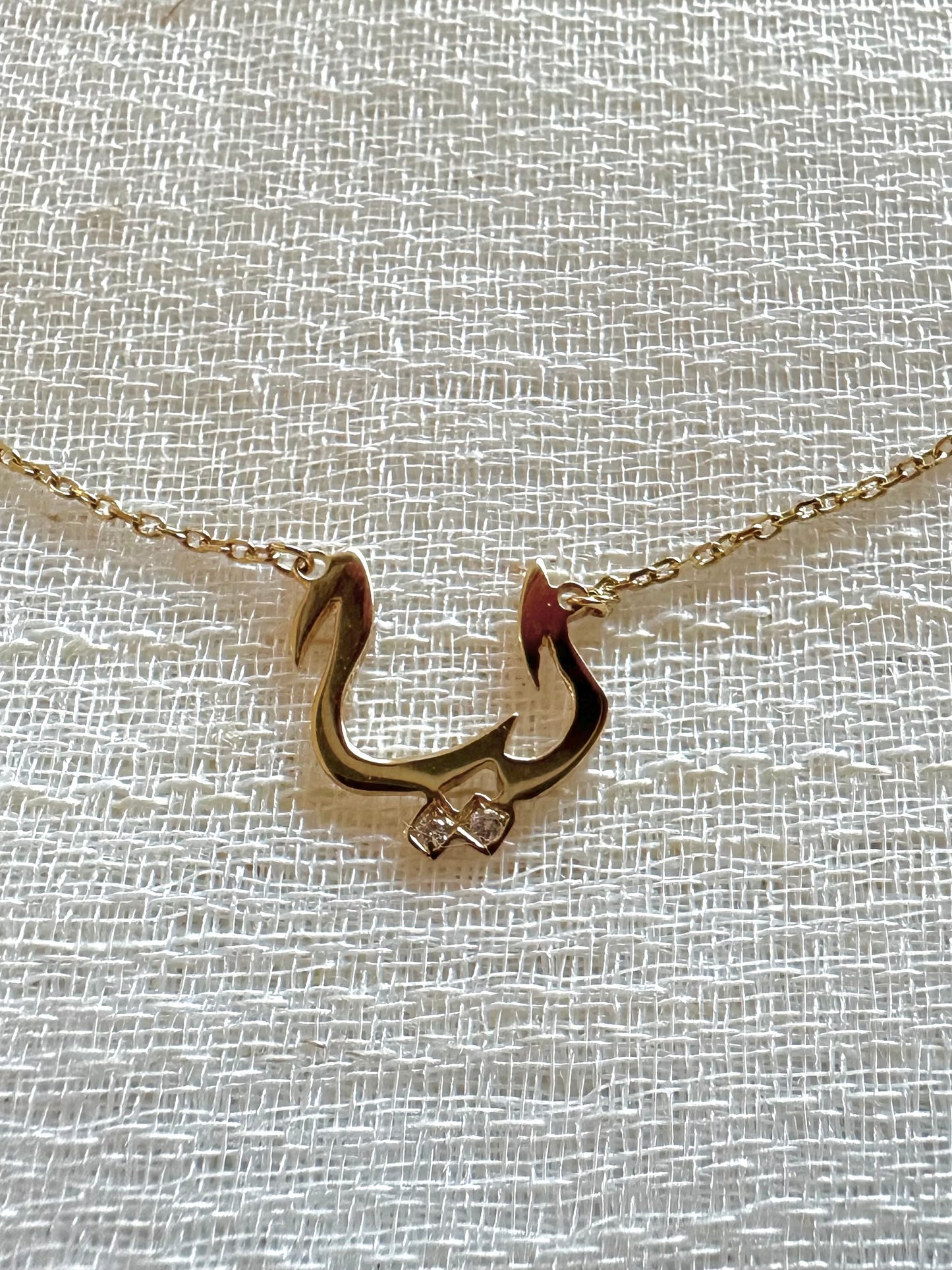 Arabic name Necklace handcrafted in 18 karat gold, with optional diamonds on the dots. This necklace is completely custom made and you can select the length of the chain. Calligraphy options will be shared with you after placing the order | Ella creations Jewelry