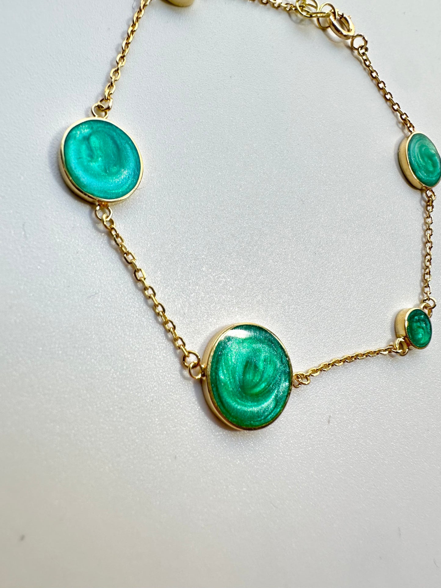 Solid Gold Bracelet perfect for everyday wear and to stack with other bracelets. This circles bracelet is handcrafted in 18 karat gold and features green malachite enamel finish | Ella Creations jewelry