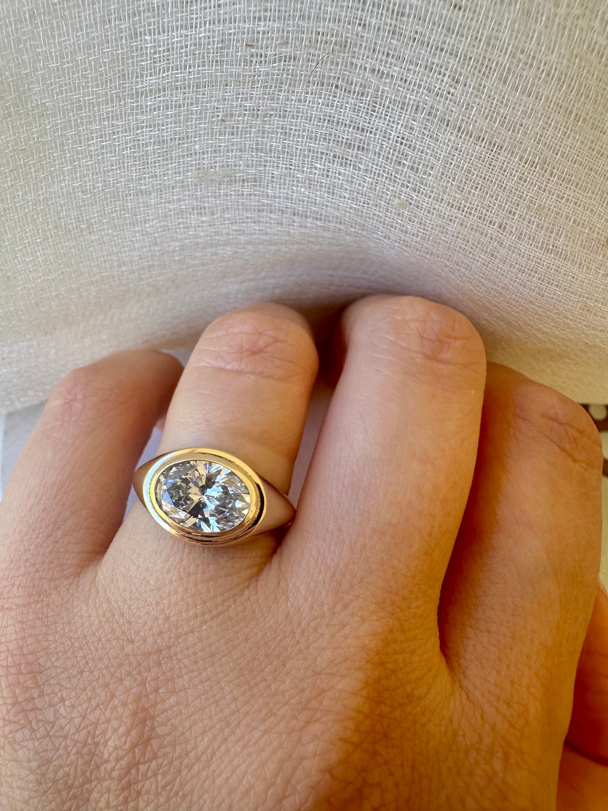 18K Oval Lab Diamond Ring, in a Signet Ring style featuring a bezel set 2ct Oval Lab Diamond | Ella Creations Jewelry