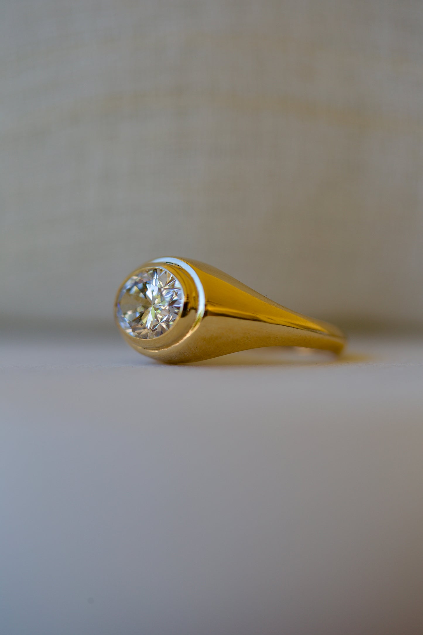 18K Oval Lab Diamond Ring, in a Signet Ring style featuring a bezel set 2ct Oval Lab Diamond | Ella Creations Jewelry