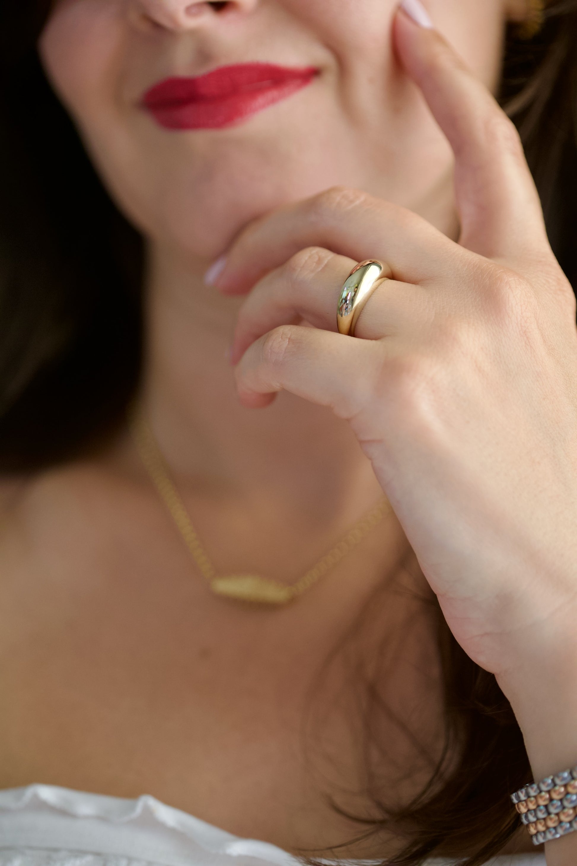 Gold dome statement ring side view, 7.5mm crown tapering to 2.5mm