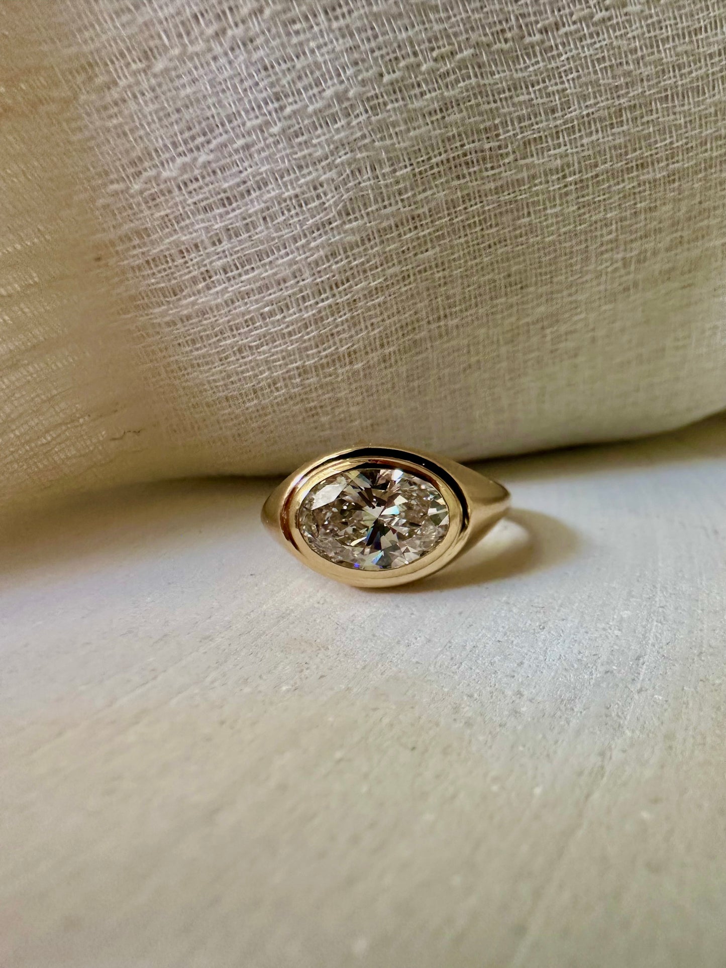18K Oval Lab Diamond Ring, in a Signet Ring style featuring a bezel set 2ct Oval Lab Diamond | Ella Creations Jewelry