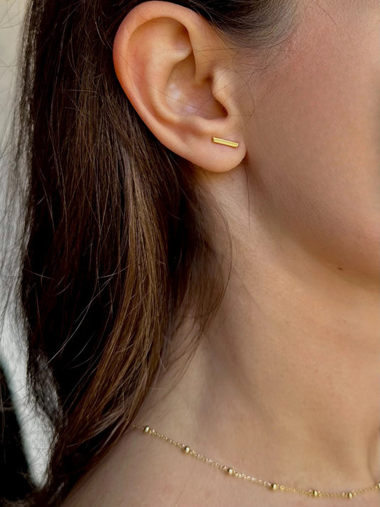 Beautiful and sleek Bar stud earrings. Handcrafted in 18 karat Gold, with a linear design that makes them comfortable for everyday wear. Sold as pair | Ella Creations Jewelry