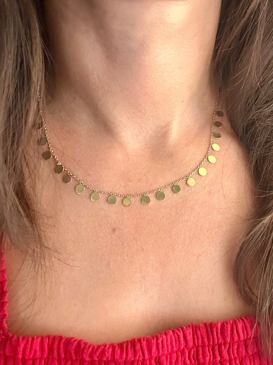 18K Gold Disc Necklace featuring 19 round discs measuring 5mm, available in 17" or 16"