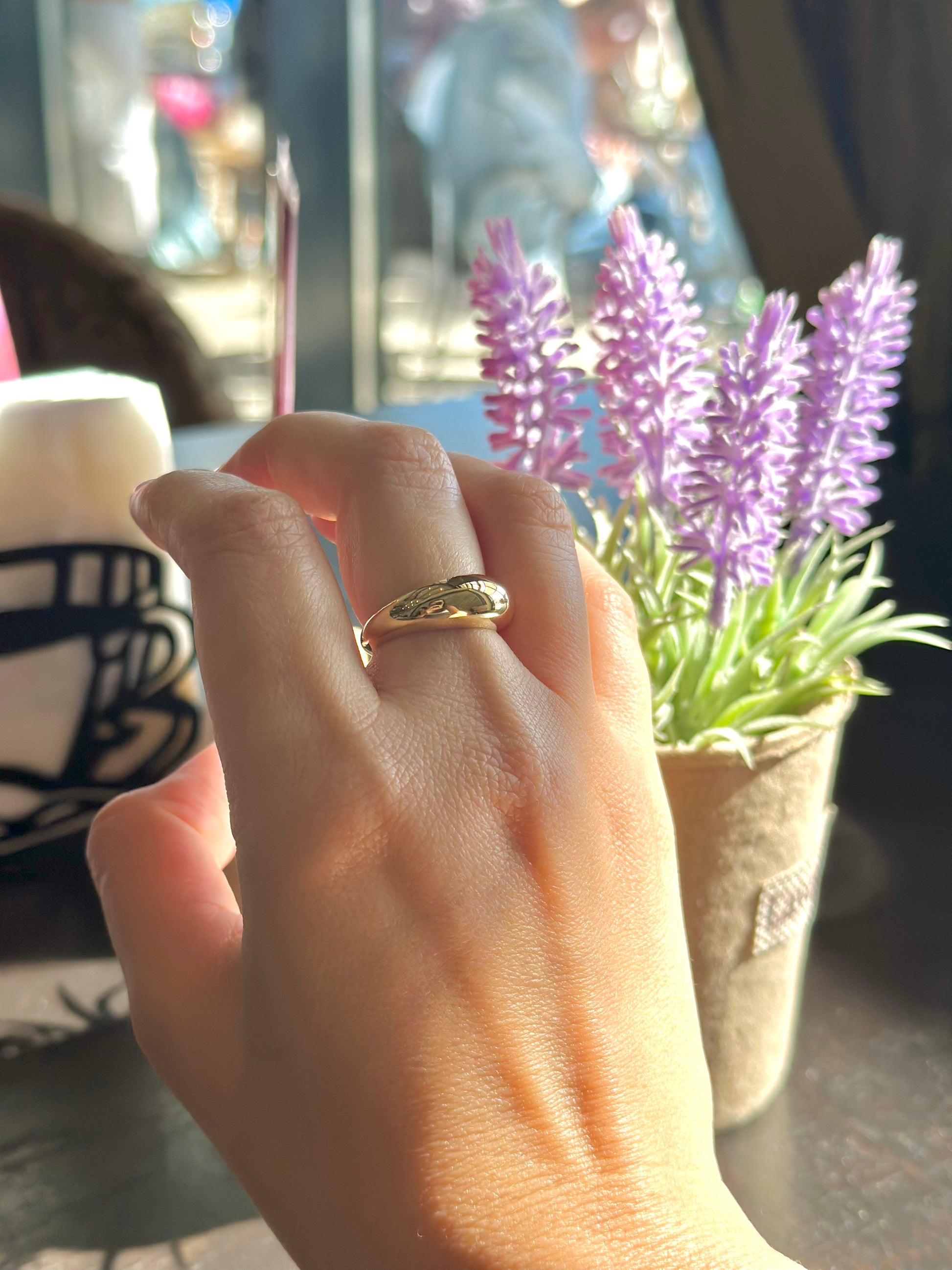 Gold Dome Ring handcrafted in 14k or 18k solid gold, the ring tampers from 7.5mm to 3mm | Ella Creations Jewelry 