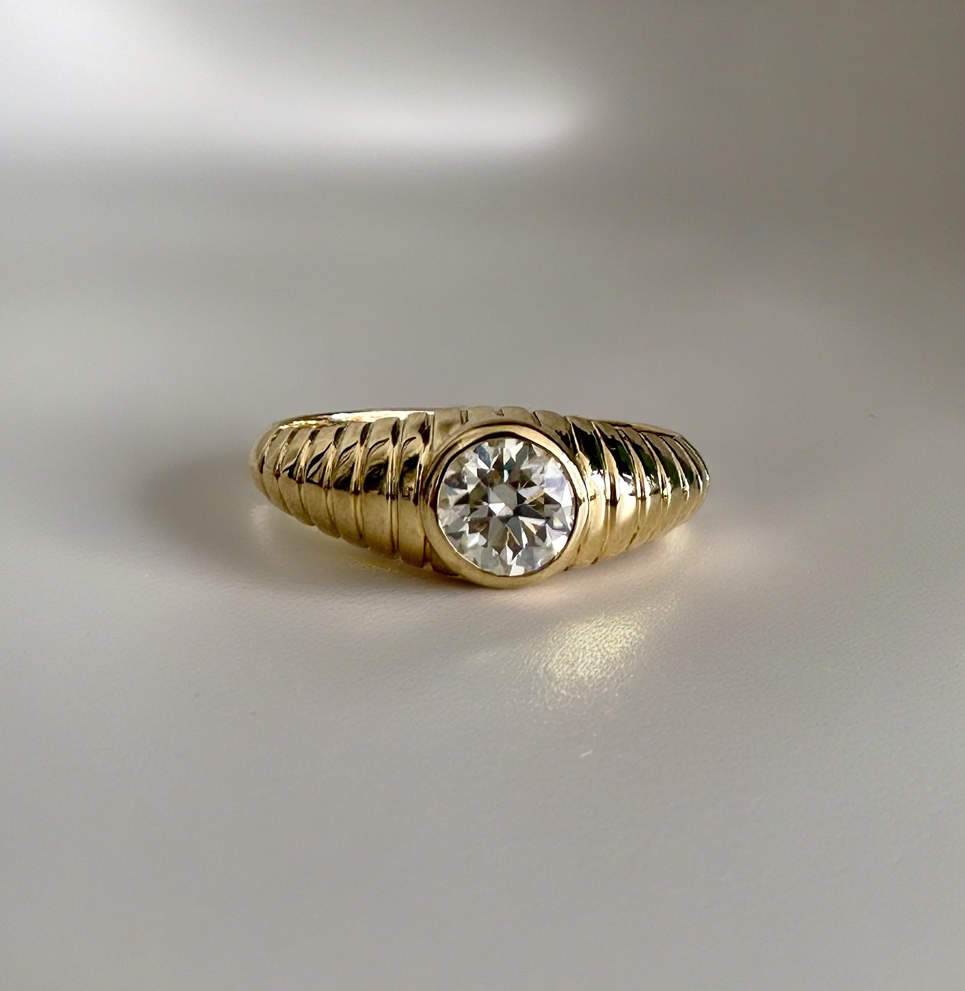 Lab Diamond Gold Ring featuring a unique design that combines modern elements with a vintage-inspired aesthetic. It's a custom made ring showcasing a 5 mm bezel set Lab Diamond at its center | Ella Creations Jewelry