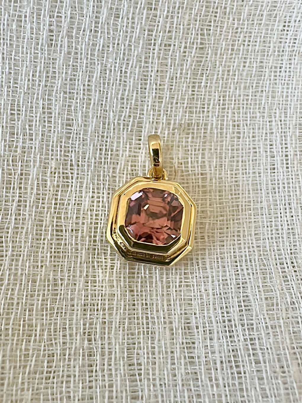 Pink Zircon pendant, set into a custom, two-tiered 18k gold bezel that matches the stone's hexagon shape. | Ella creations Jewelry
