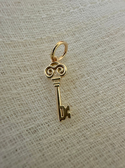 Gold Key charm inspired by the Palestinian Nakba and the hope to return, available in 14K and 18K  | Ella Creations Jewelry