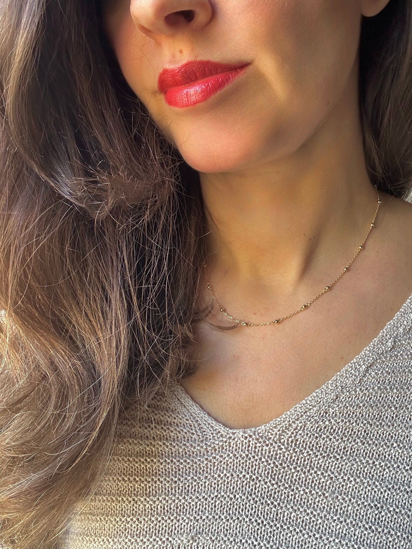 Delicate ball chain handcrafted in 18 karat gold featuring 2.5mm gold beads individually and manually wrapped onto the chain | Ella Creations Jewelry