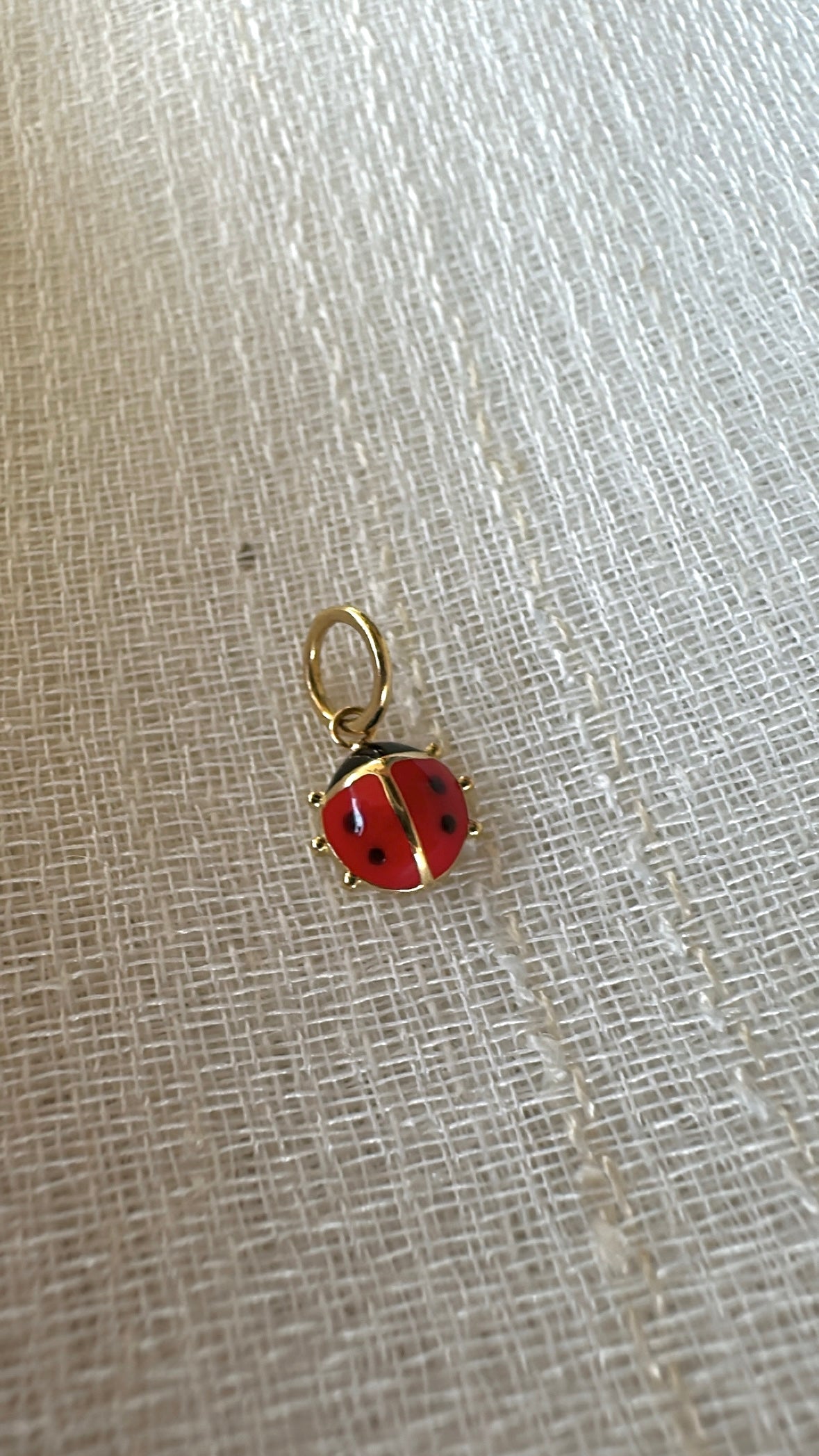18k Gold ladybug&nbsp;Charm, crafted in 18k yellow gold and beautifully accented with vibrant red and black enamel.&nbsp;