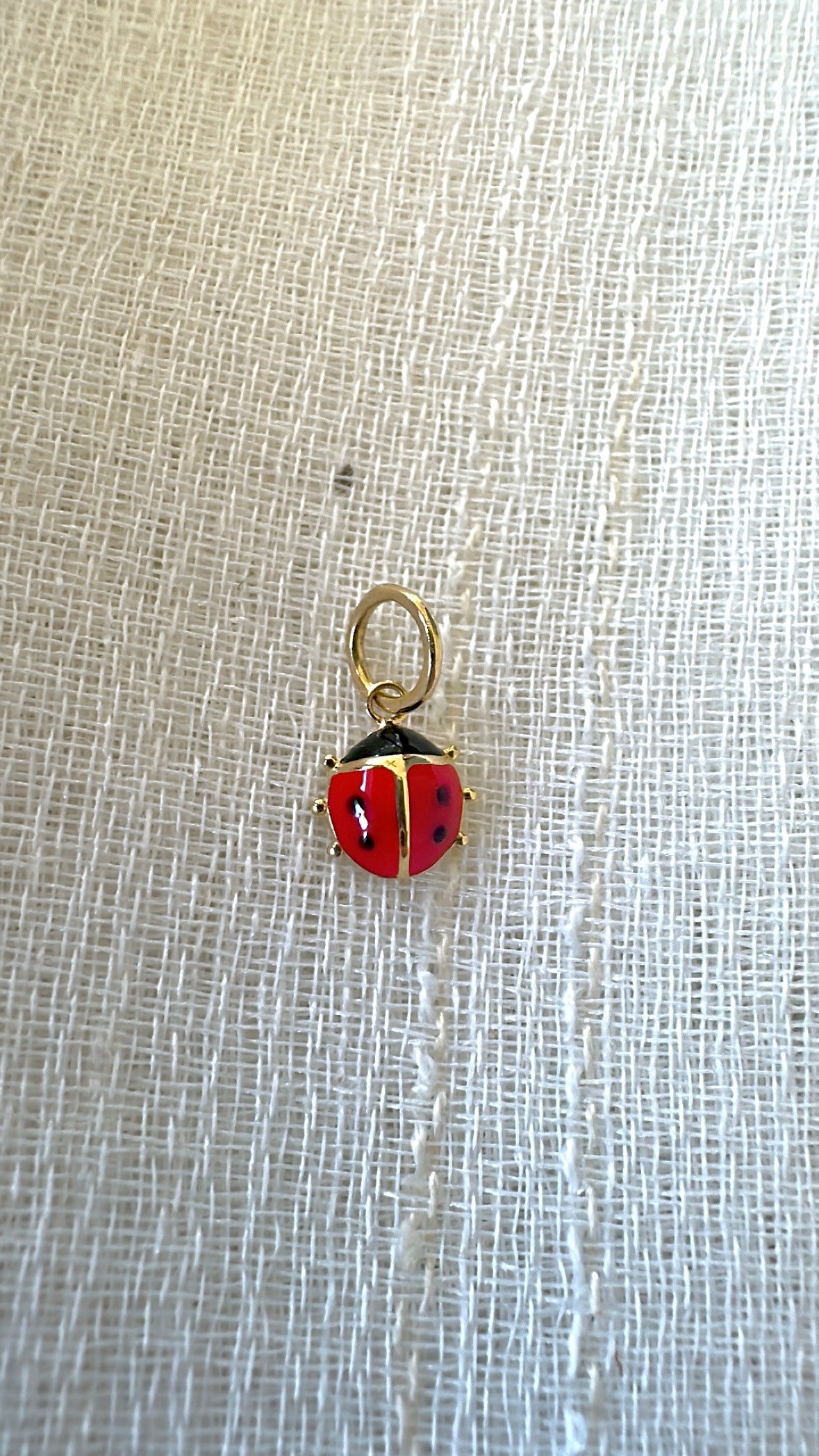 18k Gold ladybug&nbsp;Charm, crafted in 18k yellow gold and beautifully accented with vibrant red and black enamel.&nbsp;