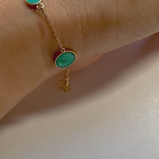 Solid Gold Bracelet perfect for everyday wear and to stack with other bracelets. This circles bracelet is handcrafted in 18 karat gold and features green malachite enamel finish | Ella Creations jewelry  