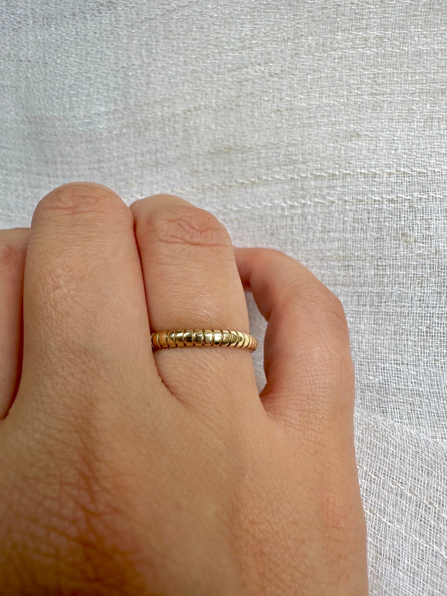 Handcrafted thin gold ring, polished ribbed texture