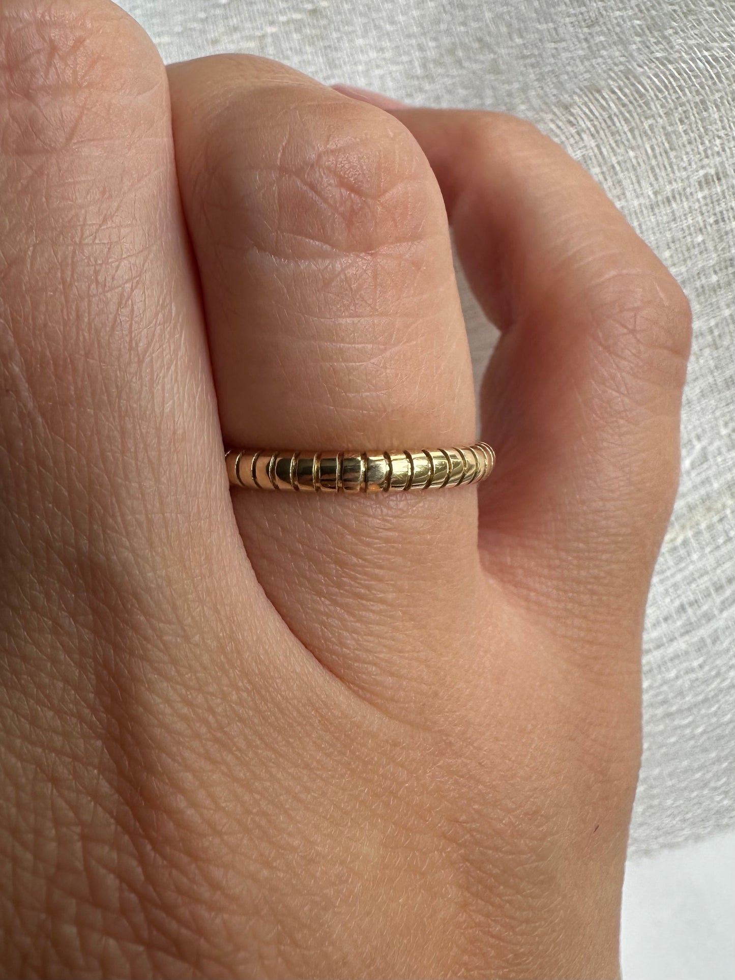 Handcrafted thin gold ring, polished ribbed texture